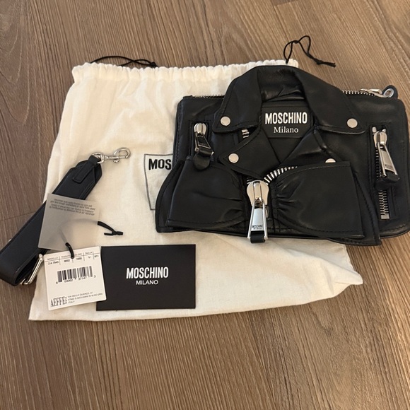 Moschino Handbags - Moschino black leather biker bag clutch with silver hardware